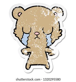 distressed sticker of a crying cartoon bear