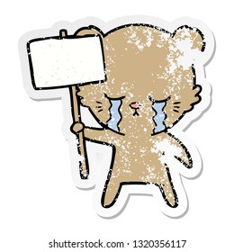 distressed sticker of a crying cartoon bear with sign post