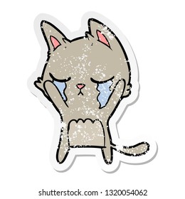 distressed sticker of a crying cartoon cat
