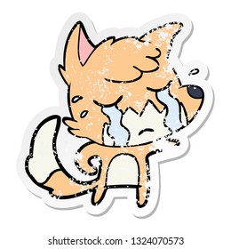 distressed sticker of a crying fox cartoon