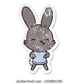 distressed sticker of a curious bunny cartoon