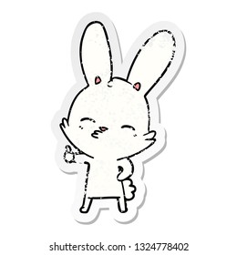 distressed sticker of a curious bunny cartoon