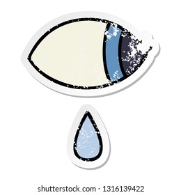 distressed sticker of a cute cartoon crying eye looking to one side