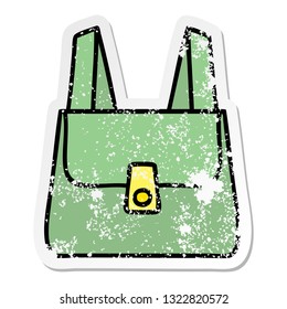 distressed sticker of a cute cartoon green bag