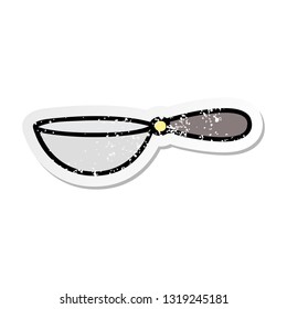 distressed sticker of a cute cartoon measuring spoon