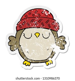distressed sticker of a cute cartoon owl in hat