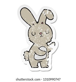 distressed sticker of a cute cartoon rabbit