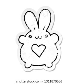 distressed sticker of a cute cartoon rabbit with love heart