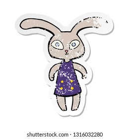 distressed sticker of a cute cartoon rabbit