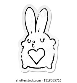 distressed sticker of a cute cartoon rabbit with love heart