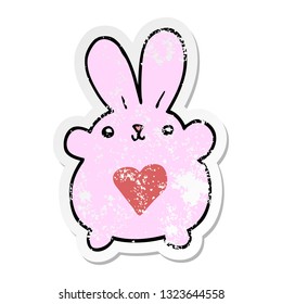 distressed sticker of a cute cartoon rabbit with love heart