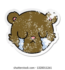 distressed sticker of a cute cartoon teddy bear face crying