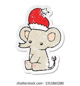 distressed sticker of a cute christmas elephant