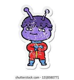 distressed sticker of a friendly cartoon spaceman