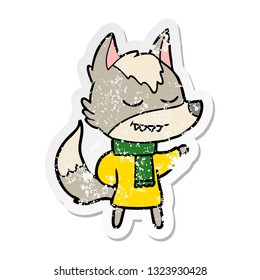 distressed sticker of a friendly cartoon wolf wearing scarf