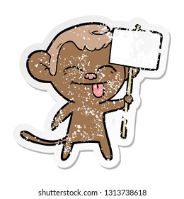 distressed sticker of a funny cartoon monkey with placard