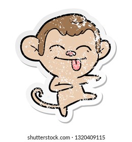 distressed sticker of a funny cartoon monkey pointing