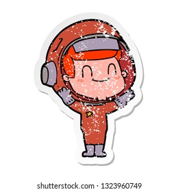 distressed sticker of a happy cartoon astronaut man