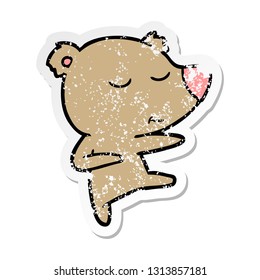 distressed sticker of a happy cartoon bear dancing