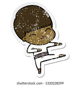 distressed sticker of a happy cartoon boy