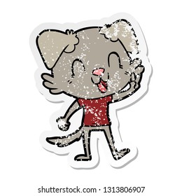 distressed sticker of a laughing cartoon dog