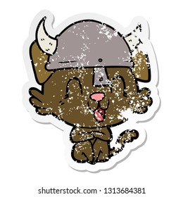 distressed sticker of a laughing cartoon viking dog