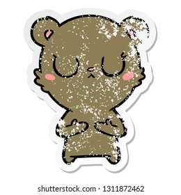 distressed sticker of a peaceful cartoon bear cub