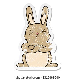 distressed sticker of a quirky hand drawn cartoon rabbit