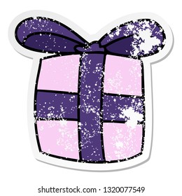 distressed sticker of a quirky hand drawn cartoon present