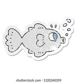 distressed sticker of a quirky hand drawn cartoon fish