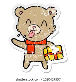 distressed sticker of a rude cartoon bear with present