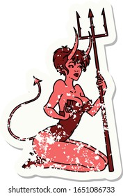 distressed sticker tattoo in traditional style of a pinup devil girl
