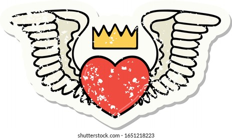 distressed sticker tattoo in traditional style of a heart with wings