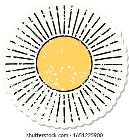 distressed sticker tattoo in traditional style of a sun
