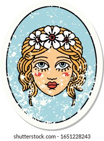 distressed sticker tattoo in traditional style of a maiden with flowers in her hair