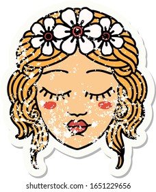 distressed sticker tattoo in traditional style of female face with eyes closed
