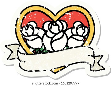 distressed sticker tattoo in traditional style of a heart and banner with flowers