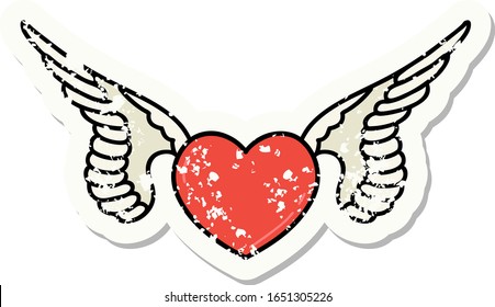 distressed sticker tattoo in traditional style of a heart with wings
