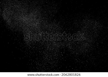 Distressed white grainy texture. Dust overlay textured. Grain noise particles. Snow effect. Rusted black background. Vector illustration, EPS 10.  