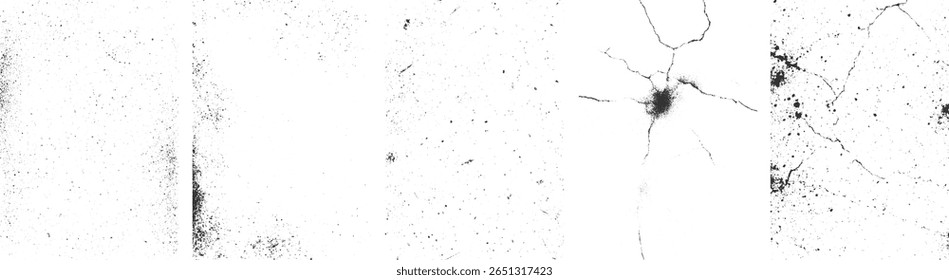 Uma superfície branca angustiada com manchas pretas dispersas e fendas proeminentes.