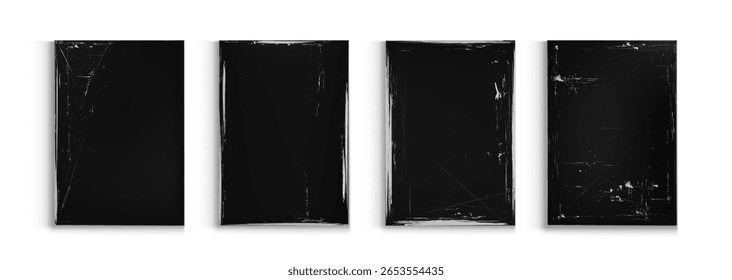 Distressed worn paper textures with black background - vintage scratched rectangles with aged surface damage. Grunge overlay effects for retro poster design. Antique document mockup or weathered bg.
