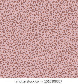 Ditsy animal skin texture seamless pattern. Tossed hand drawn background. Pink brown spice color muted tones. All over print for fall autumn textile. Retro vintage vector repeat eps10