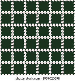 Ditsy daisy check seamless repeat pattern. Floral grid all over print with dark green background.	