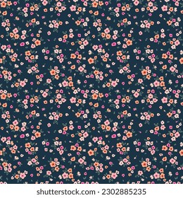 Ditsy floral pattern. Abstract flowers on dark blue background. Printing with small orange and pink flowers. Cute print. Seamless vector texture. Spring bouquet.