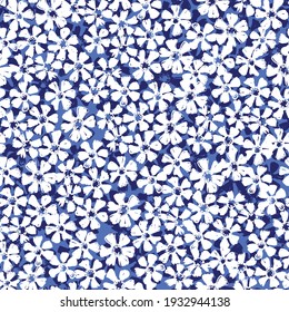 Ditsy floral pattern on blue background. Seamless vector pattern