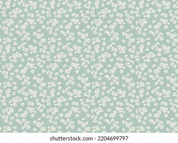 Ditsy floral pattern. Pretty flowers on light blue background. Printing with small white flowers. Cute print. Seamless vector texture. Spring bouquet.