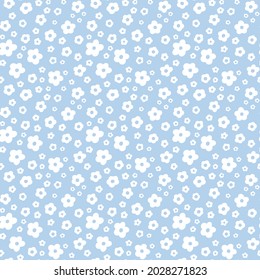 Ditsy Floral seamless pattern. Small white meadow flowers on sky blue background. Vintage Millefleur tiny wildflower. Vector texture for fashion, nursery print, textile, fabric, wrap, gift paper