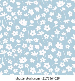 Ditsy floral vintage seamless pattern. Cute fashion print with small hand drawn flowers. Retro botanical vector background