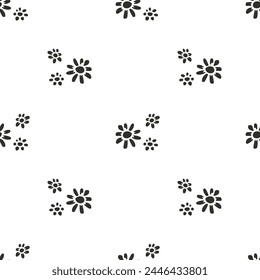 Ditsy monochrome seamless pattern with black flowers on white background. Retro floral repeat pattern.