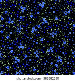 Ditsy Seamless Pattern in Country Style. Tiny Bright Flowers on Black Background. Dark Floral Pattern for Textile, Fabric, Calico, Print. High Coverage Ornament